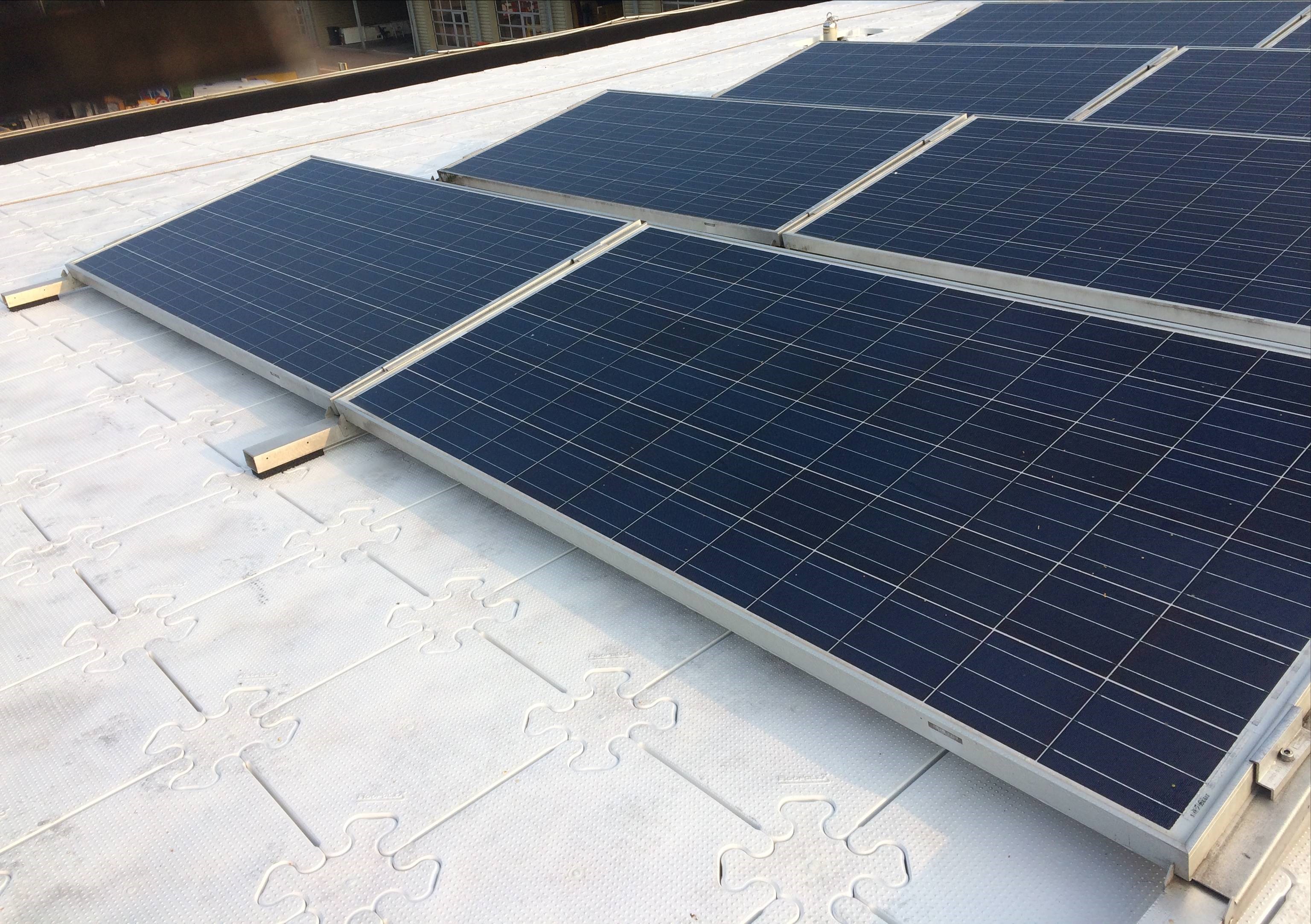 Solar panelling system installed on rooftop mounted with RoofClix panels